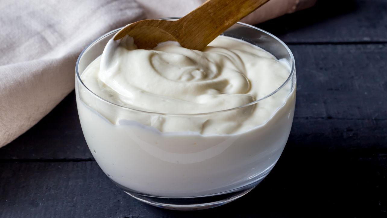 Bowl of Yogurt with Spoon